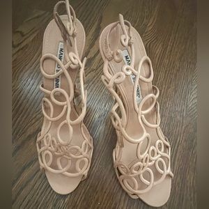 Manolo blahnik heels. Cream color. Bottom worm but rest in good condition